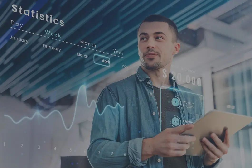 Man with tablet reviewing financial data through AI